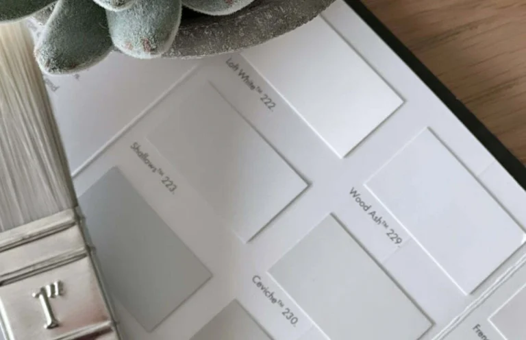 Paint swatch book samples on a table